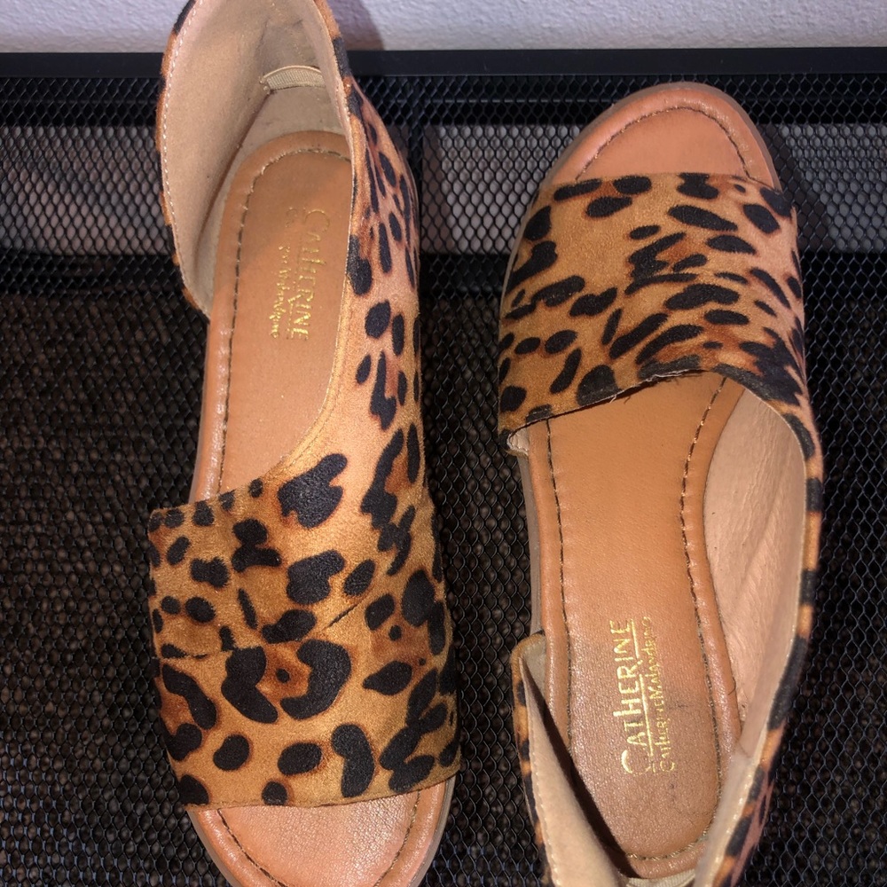 Lightly worn sandals. Cheetah print.